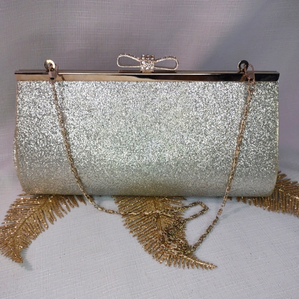 Silver bow clutch purse..